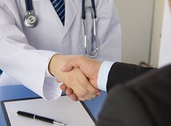 A doctor treats gout