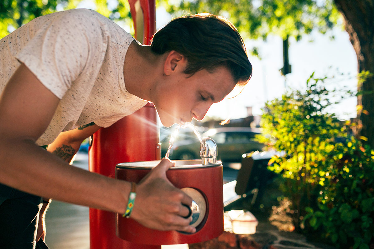 Drinking from a Public Water Fountain