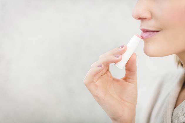 Applying Chapstick or Vaseline