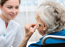 a woman who is curious about hearing aids and medicare